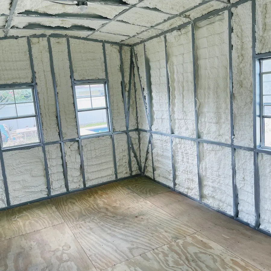 Closed-cell spray foam insulation applied to wall cavities in a residential project in Mount Sterling